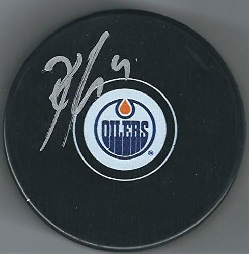 KRIS RUSSELL Edmonton Oilers Hockey Puck - autographed NHL Pucks