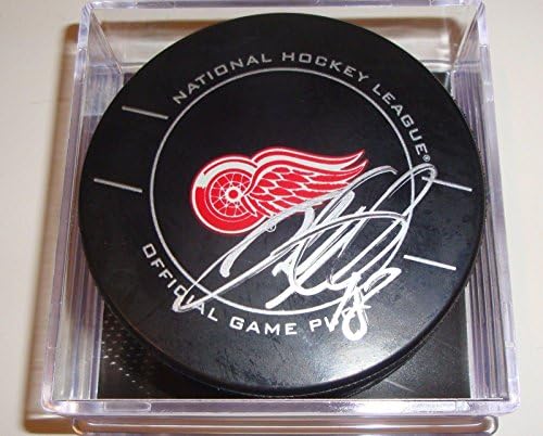Ian White potpisan Pak w / COA Detroit Red Wings zvanična igra Pak-potpisani NHL Paks